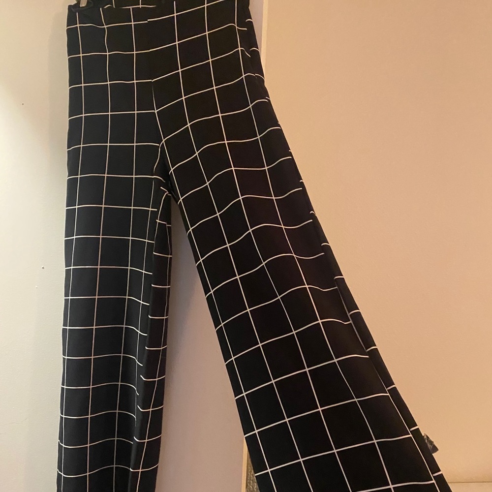 High waisted checker flare pants from Fashion Nova